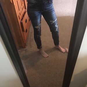 Kancan jeans.  Destructive and dark.  Mid-rise